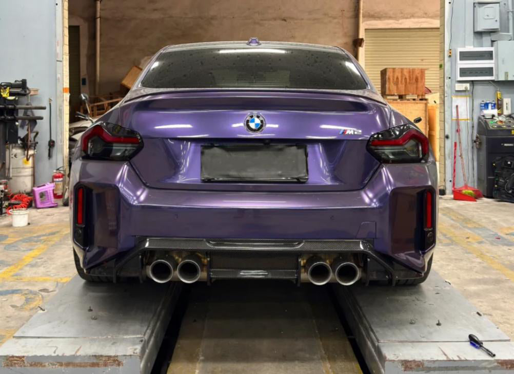 ADV2 Type Rear Diffuser in dry carbon fiber for the BMW G87 M2, fitted