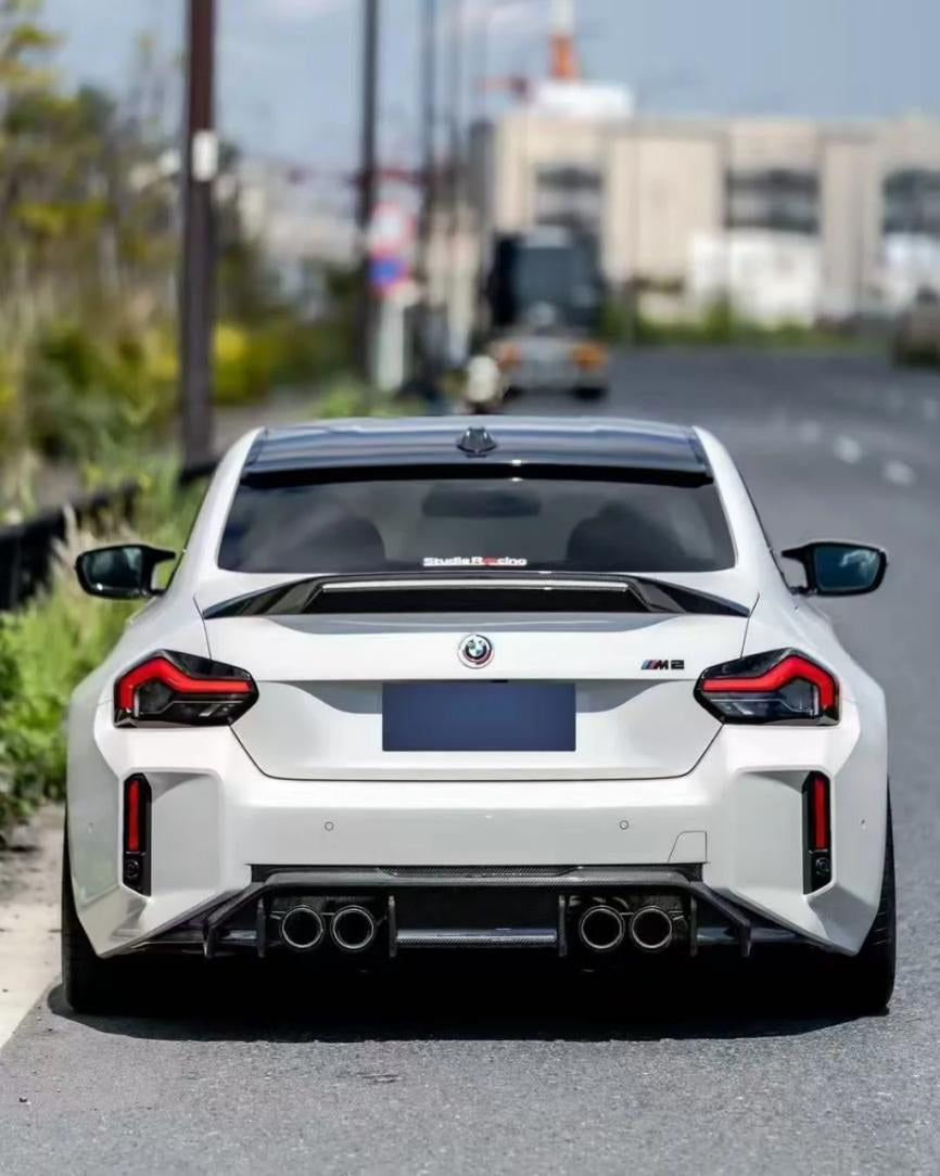 ADV2 Type Spoiler in dry carbon fiber for the BMW G87 M2, fitted