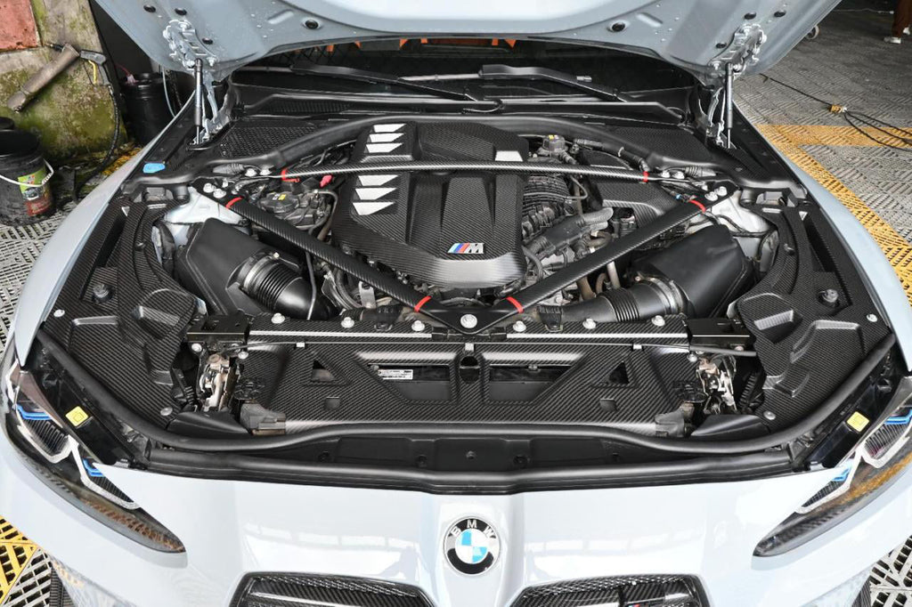 Engine Cover Trim Set in dry carbon fiber for the BMW G87 M2, fitted