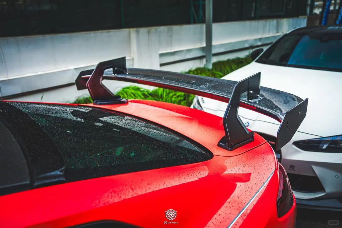 GT4 Type Rear Spoiler (With Mounting Base) in dry carbon fiber for the BMW G80 M3 / G82 M4, fitted