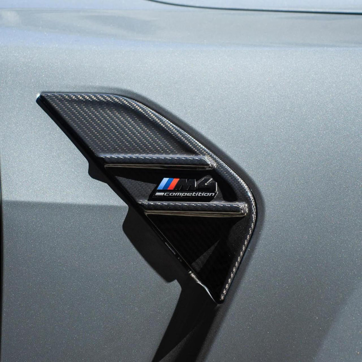 MP Type Side Badge in dry carbon fiber for the BMW G80 M3 / G82 M4, fitted