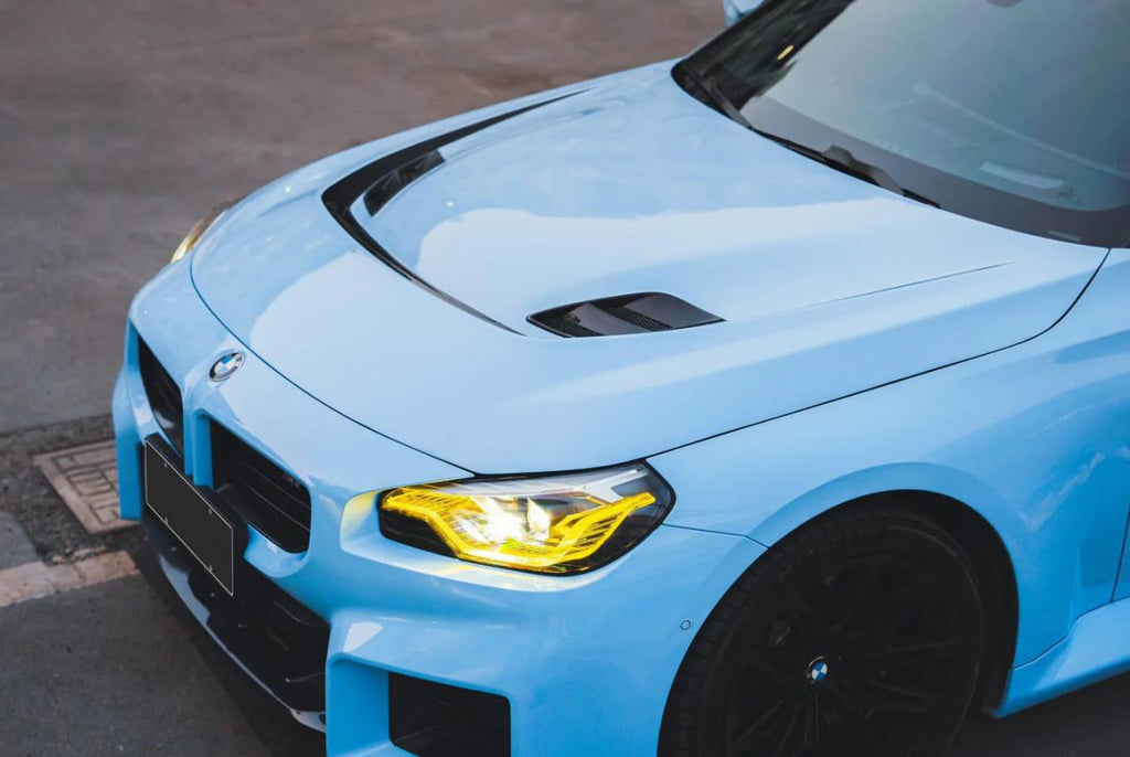 N2 Type Vented Hood in dry carbon fiber for the BMW G87 M2, fitted