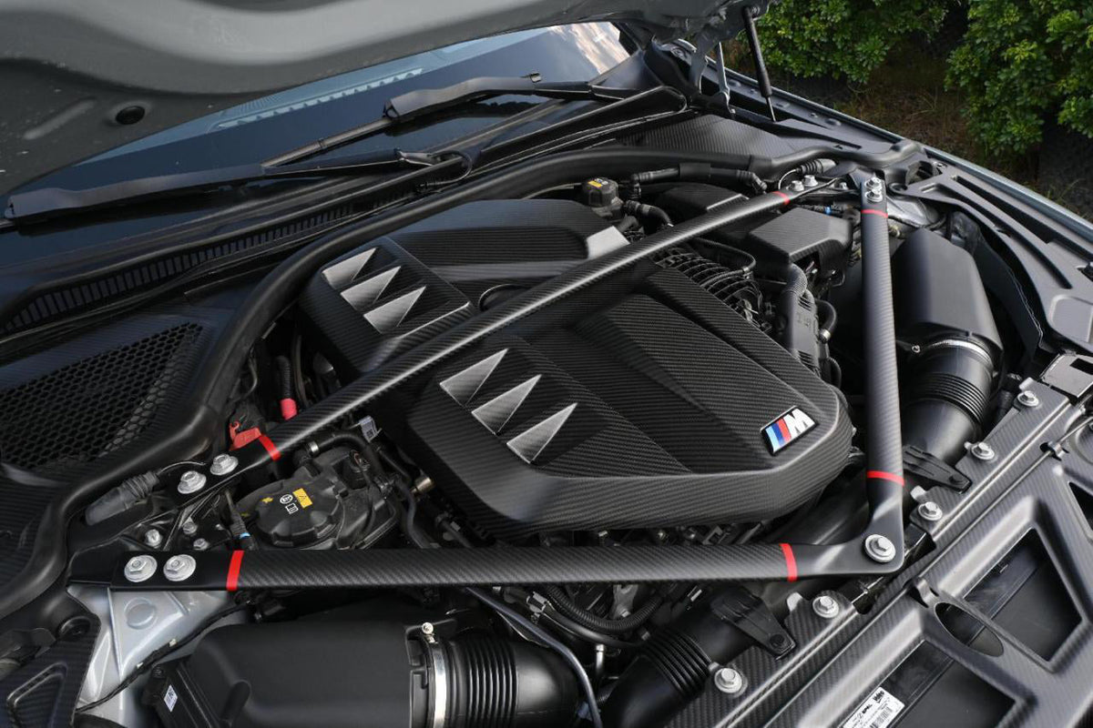 OEM Type Strut Brace in dry carbon fiber for the BMW G80 M3 / G82 M4 / G87 M2, fitted