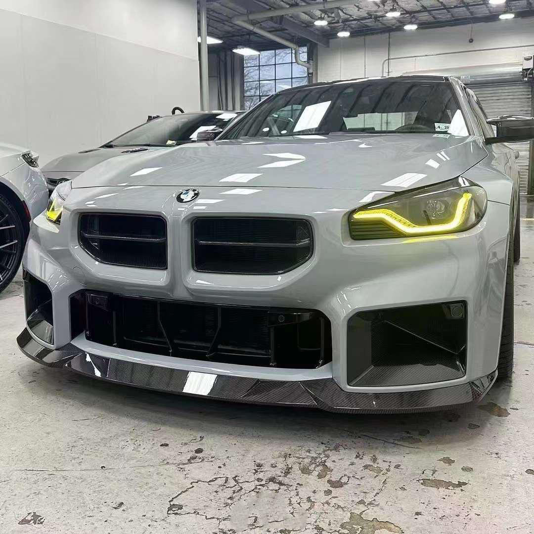 R44 Type Front Lip in dry carbon fiber for the BMW G87 M2, fitted