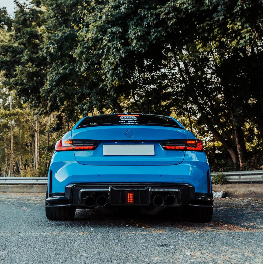 R44 Type LED Lighted Rear Diffuser in dry carbon fiber for the BMW G80 M3 / G82 M4, fitted