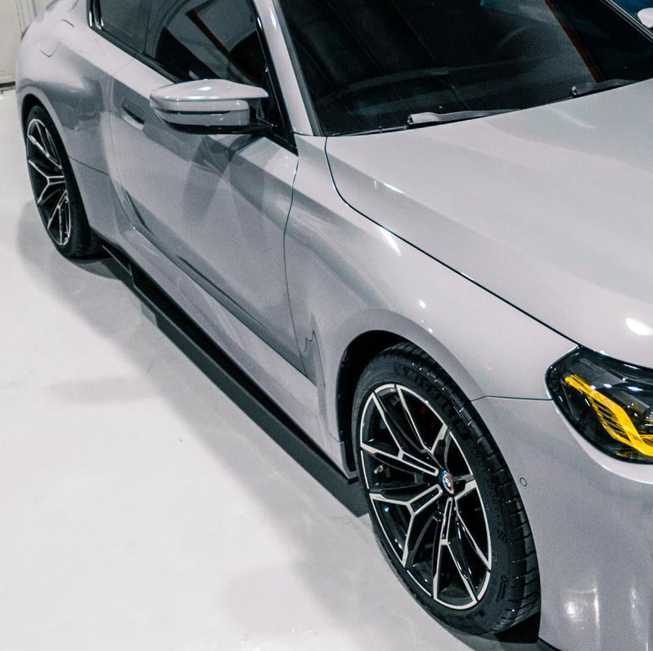 R44 Type Side Skirt in dry carbon fiber for the BMW G87 M2, fitted