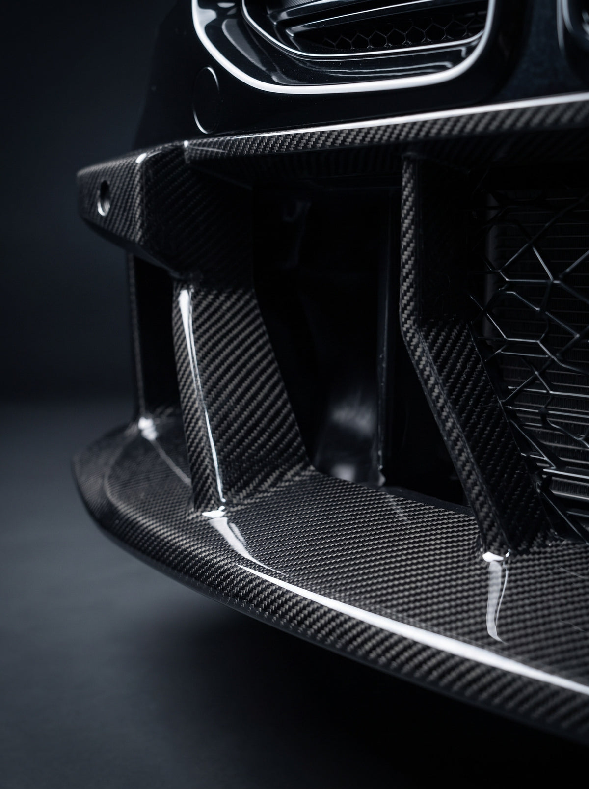 Dry carbon, not a wet-lay copy under a wrap