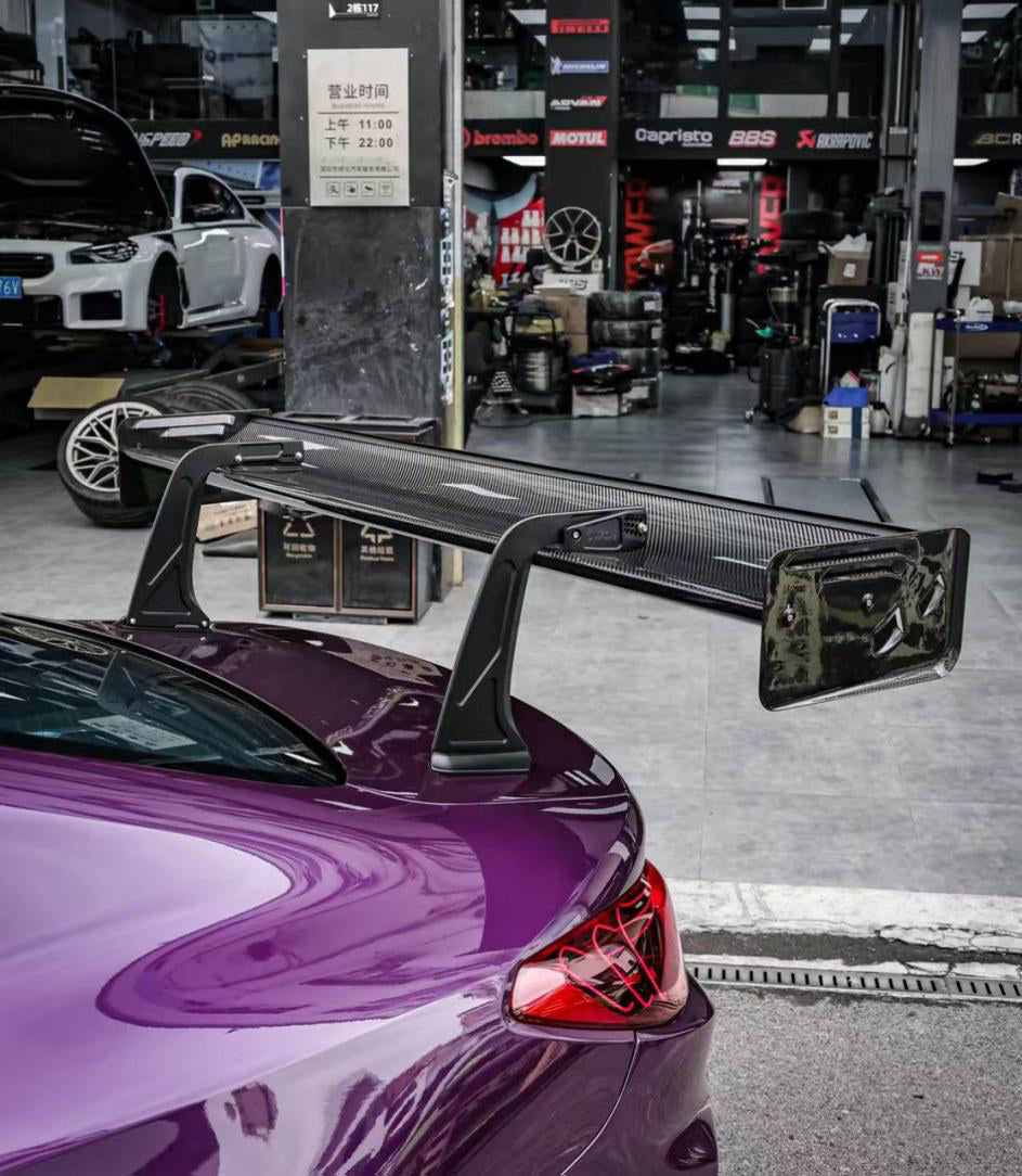 V1X Type Swan Neck Rear Spoiler (With Mounting Base) in dry carbon fiber for the BMW G80 M3 / G82 M4 / G87 M2, fitted